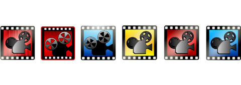 Vijf filmprojector-iconen in verschillende kleuren: rood, blauw, geel, rood, blauw.