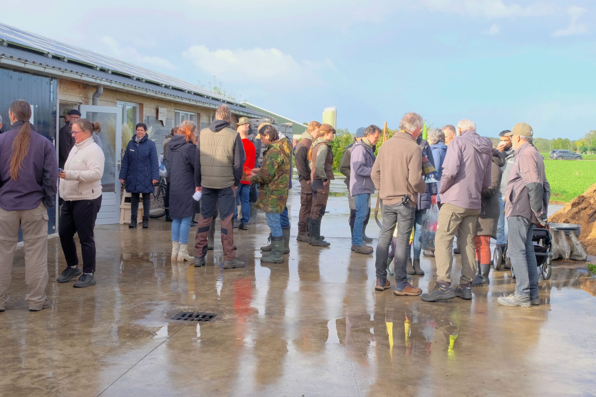 Boeren en buren op een erf
