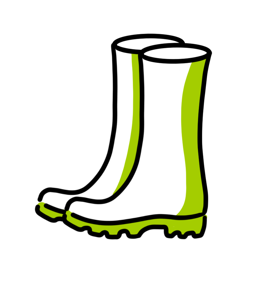 Witte en groene rubberen laarzen tegen een zwarte achtergrond.